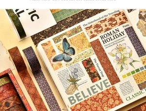 Vintage style washi tape set applied on a notebook with artistic English typography detail