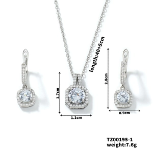 Detail view of silver square halo necklace and earrings set with crystal size dimensions