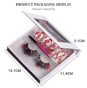 Detailed product packaging display of Christmas themed false eyelashes and press-on nails