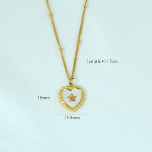 Detail of 14K gold heart pendant with pink star crystal and 41+5cm beaded chain dimensions