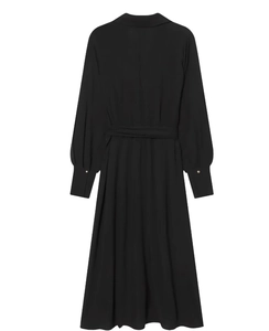 Detail of black long sleeve shirt dress back view with cinched waist and buttoned cuffs