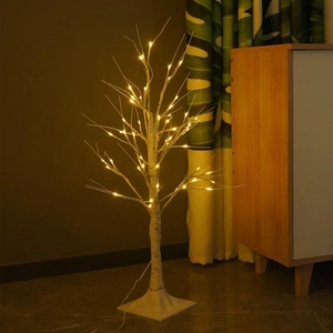 Warm white LED birch tree lamp with realistic bark texture and square base for home decor