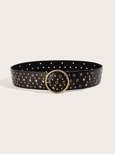 Detail of black wide PU leather belt with vintage metal ring eyelets and round buckle