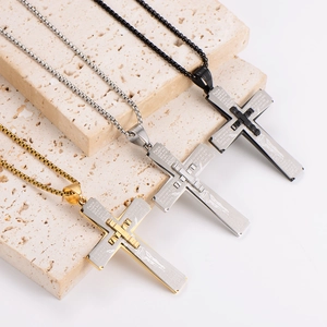 Three retro cross necklaces in gold, silver and black with engraved Spanish prayers