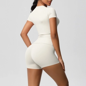 Detail view of the slim fit beige yoga set showing high elasticity and butt-lift design