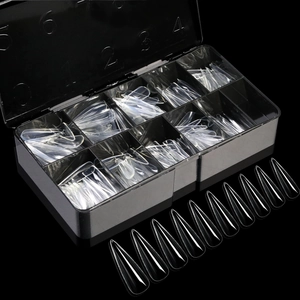 Clear coffin and almond false nail tips set in a black 12-slot storage box organizer