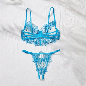 Detail of royal blue floral embroidery lace lingerie set with strappy back design
