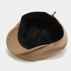 Classic dark khaki newsboy hat with black inner lining and adjustable drawstring detail