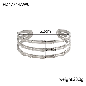 Detailed view of triple-layered silver titanium steel bangle with 6.2cm diameter dimensions