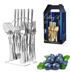 Detailed view of a 24-piece stainless steel cutlery set with rack and navy blue gift box