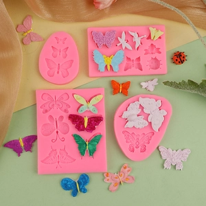 Pink silicone butterfly fondant molds for cake decorating and craft projects