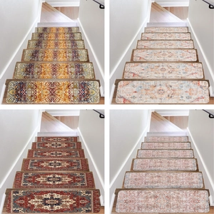 Detail view of four vintage Persian style non-slip stair treads in various floral patterns