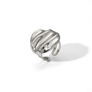 Macro view of water ripple texture on polished stainless steel adjustable open ring