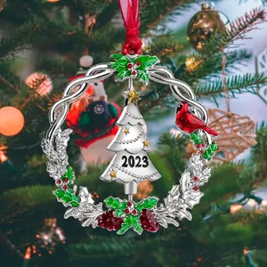 Silver metal Christmas wreath ornament with red cardinal bird and 2023 tree pendant