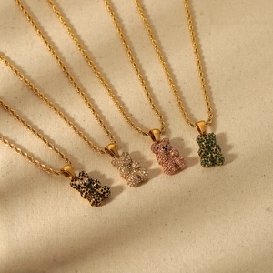 Ciondoli a forma di orsetto glitterato con catene a corda dorate in nero, bianco e rosa