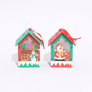 Detail of wooden LED Christmas house ornaments with HOME and Merry Christmas cutouts