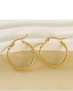 Detail of 18K gold plated hoop earrings with lead-free and nickel-free texture detail