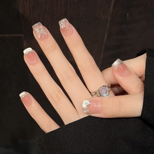 French crystal cat eye press-on nails with white butterfly and pearl accents
