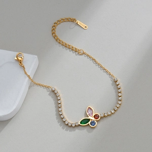 Gold stainless steel butterfly bracelet with colorful gemstones and white cubic zirconia
