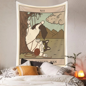 Macro detail of Bohemian cat tarot tapestry showing the hanged cat design on a bedroom wall