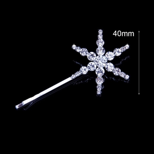 Close-up of sparkling rhinestone snowflake hair clip showing 40mm size detail