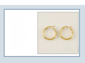 Detailed view of 18K gold plated stainless steel earrings with Greek fret pattern