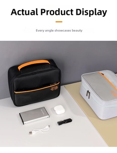 Water-resistant nylon digital accessories organizer bag with reinforced handle and pockets