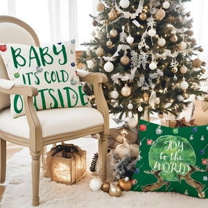 Christmas reindeer cushion covers in green and white linen for festive home sofa decor