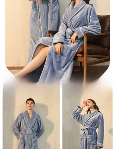 Detailed view of plush thick flannel bathrobe with white contrast trim and soft texture