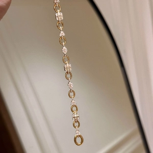 Elegant 18K gold-plated bracelet with rectangular and marquise cut cubic zirconia stones