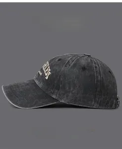 Detail of vintage washed baseball cap with 3D embroidery and adjustable metal buckle