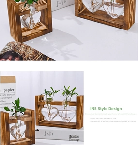 Macro shot of heart-shaped glass plant containers on a rustic wooden stand decor
