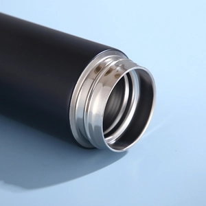 Matte black stainless steel insulated bottle with silver interior and wide mouth design