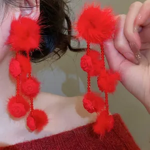 Elegant red faux fur ball earrings with rose charms and long fringe tassels for women