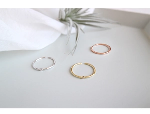 Detailed view of minimalist S925 sterling silver adjustable rings with tiny zircon stone