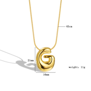 Detail view of 18K gold plated letter G balloon pendant with size and weight specs
