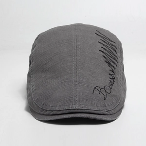 Dark gray men's cotton flat cap featuring stylish side embroidery on a white background