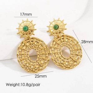Detail view of gold bohemian earrings with green stone and measurements 17mm to 28mm