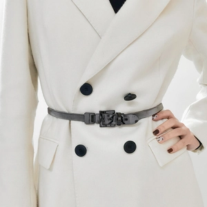Adjustable silver spring metal waist chain belt with square buckle on white blazer