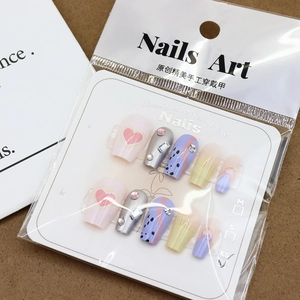 Sweet pink and purple handmade press-on nails set with heart art and rhinestones