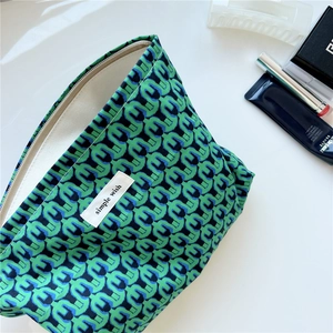 Floral print cotton makeup pouch with zipper and woven simple wish label