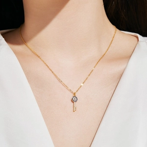 S925 sterling silver gold necklace with sparkling evil eye encrusted key pendant for women