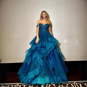 Sapphire blue off-shoulder tiered ruffled evening gown with sequins and tulle skirt