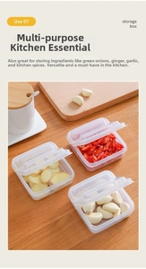 Close-up of three square transparent storage boxes for ginger, chili, and garlic