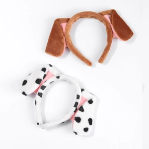 Detail of plush Dalmatian and brown dog ear headbands for Halloween costume accessories