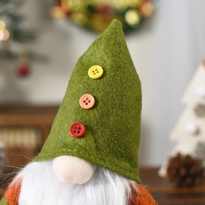Detailed macro view of a Christmas gnome featuring a felt hat and faux fur beard