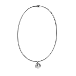 Detail of minimalist snake chain necklace featuring a polished silver hollow ball pendant