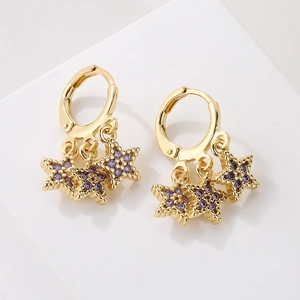 Elegant 18K gold plated star earrings with purple zircon stones on a white base
