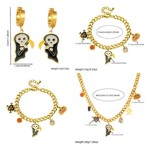 Halloween jewelry set with pumpkin and skull charms, includes necklace and bracelets