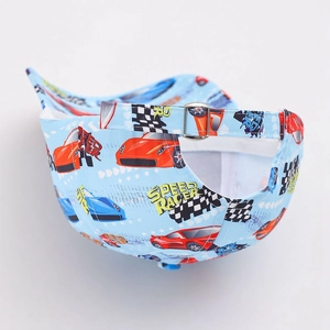 Detail of adjustable metal buckle and speed racer print on kids blue baseball cap